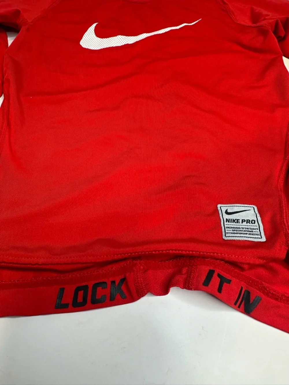 Nike Red Performance Long Sleeve Top with White Tag Detail